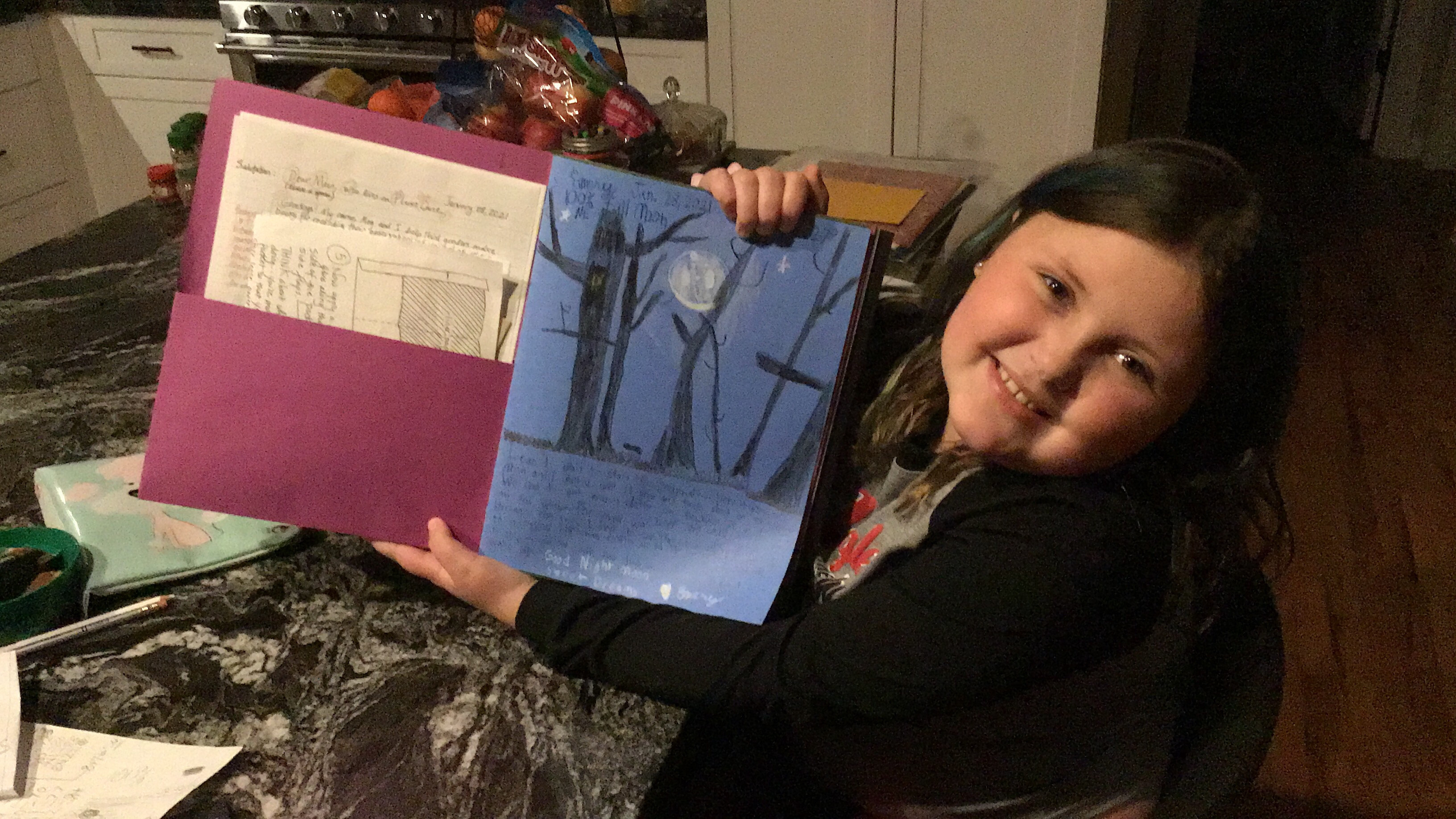 Emery Newton, a student in Michelle Stafford’s third-grade class at Deyton, shows off her first entry in her moon journal. The moon journal project took on a new virtual format this year. (Submitted)