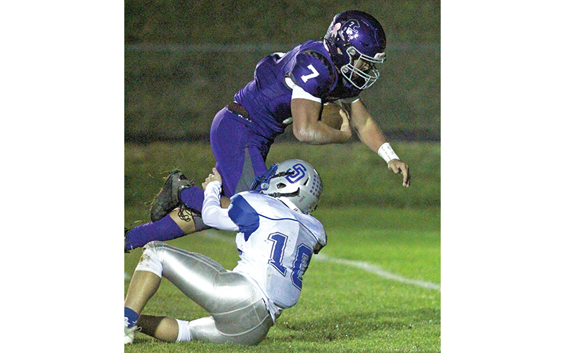Senior Ethan Willis goes airborne over a South Davidson defender as he scores. MNJ photos/ Cory Spiers a first quarter touchdown.