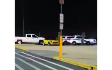 Photo submitted A video from the incident shows the yellow Mini driven by Ledford surrounded by police cars. 