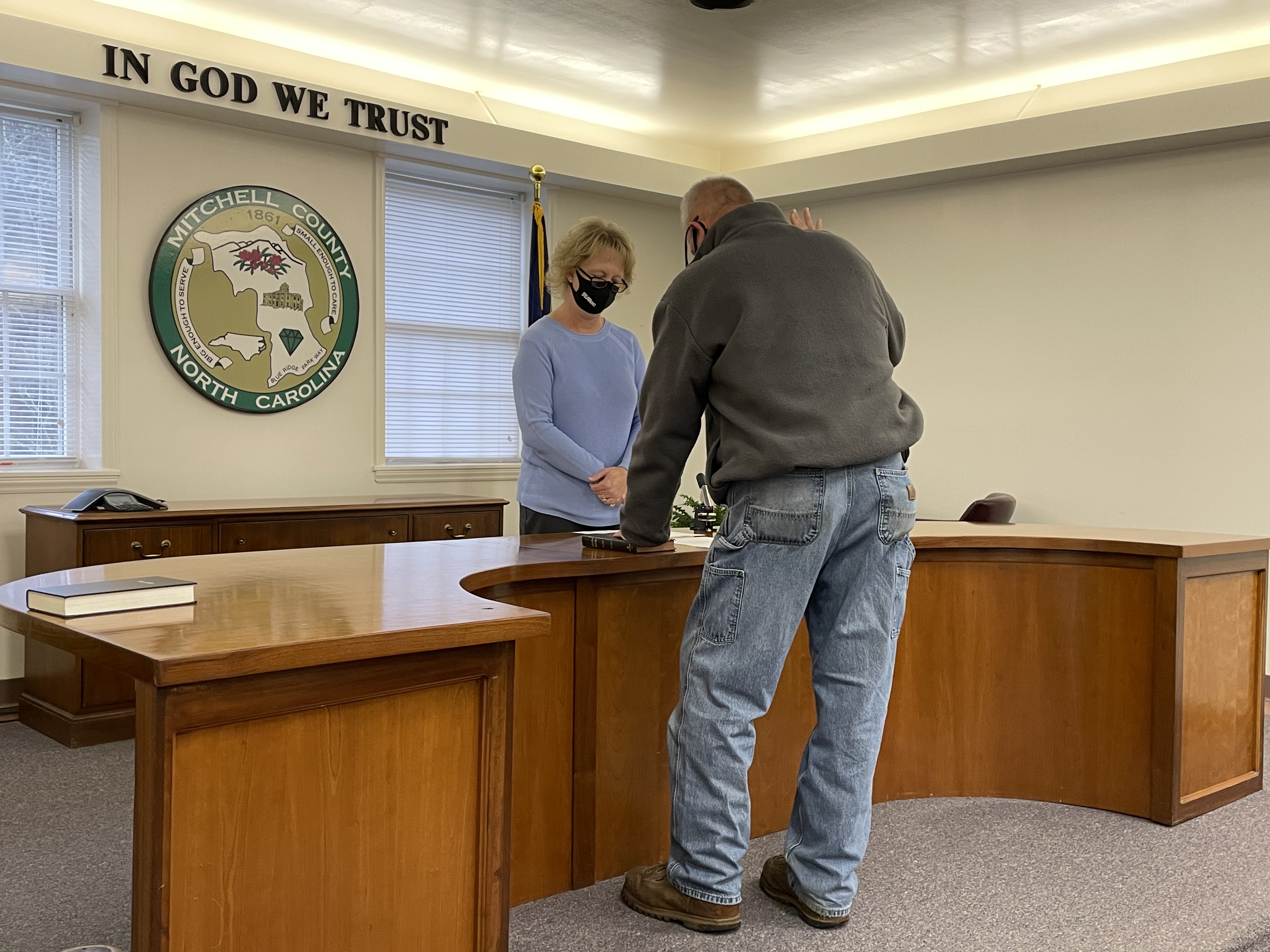 Re-elected Commissioner Jeff Harding is sworn in by Mitchell County Register of Deeds Kathy Laws on Monday, Dec. 7. (MNJ photos/Juliana Walker)