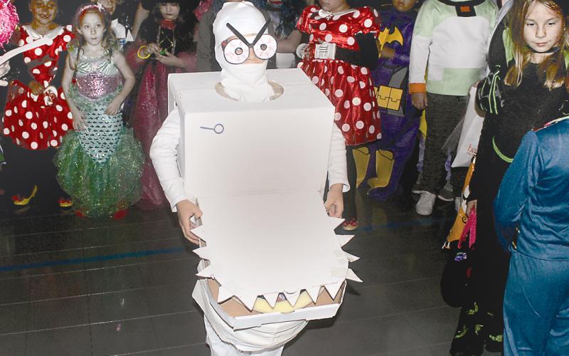 Francisco Good, 8, of Cashiers wears a toilet-like outfit while portraying “Captain Underpants” at the 2018 Goblins in the Green. The outfit was judged “Most Creative” at the Village Green-sponsored Halloween-theme celebration. (Parks and Rec and the Boys and Girls Club are additional sponsors.) The 2019 celebration is this Friday.