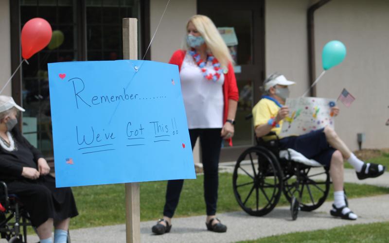 Positive posters like this one which reads "Remember... We've got this!" appeared around the Brian Center during the parade on May 14. (Photos by Juliana Walker/MNJ)