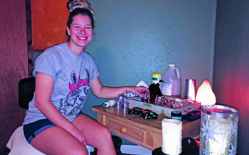 Jessie Bomar smiles as she prepares to give a client a massage at her business, Ohana. Bomar offers injury recovery and relaxation massages in her studio. She has been open since 2018 but has recently captured the most business she has had to date. (MNJ photo/Cory Spiers)