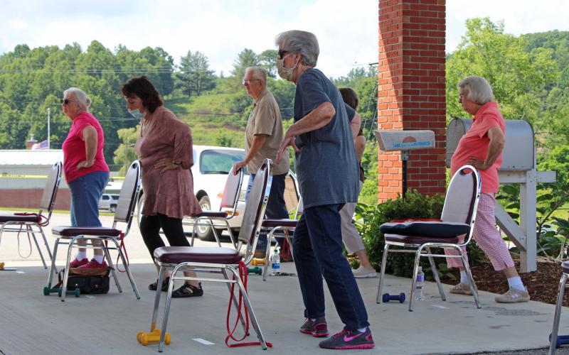 Seniors participate in an exercise class at the Mitchell County Senior Center. Pictured Left to right: Eva Cullifer, Jessie Woody, David Ollis, Mila Black and Mattie Sparks. Photos by Juliana Walker/MNJ