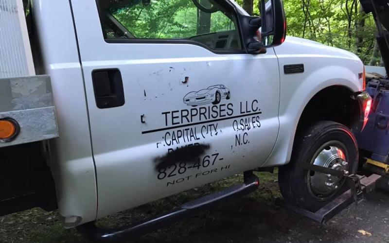 Two men were arrested this past week accused of stealing a rollback truck belonging to Mitchell County Commissioner Matthew “Vern” Grindstaff.