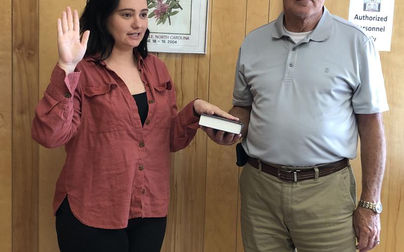 Mitchell County native Abby Garland is sworn into office Tuesday, July 28 by Bakersville Mayor Charles Vines. (Submitted photo)