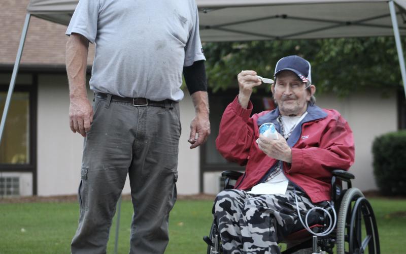 A Brian Center resident enjoys a frozen treat from Fire &amp; Ice Snowballs &amp; Ice Cream as he waits for the fireworks show to begin on Thursday, Aug. 20. (MNJ Photo/Juliana Walker)