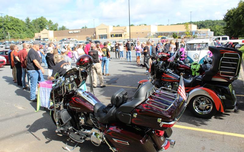 The participants of the second annual Maggie’s Ride gather around and hear a short speech from Amy Young before starting their engines and leaving as a collective unit. (MNJ photo/Cory Spiers)