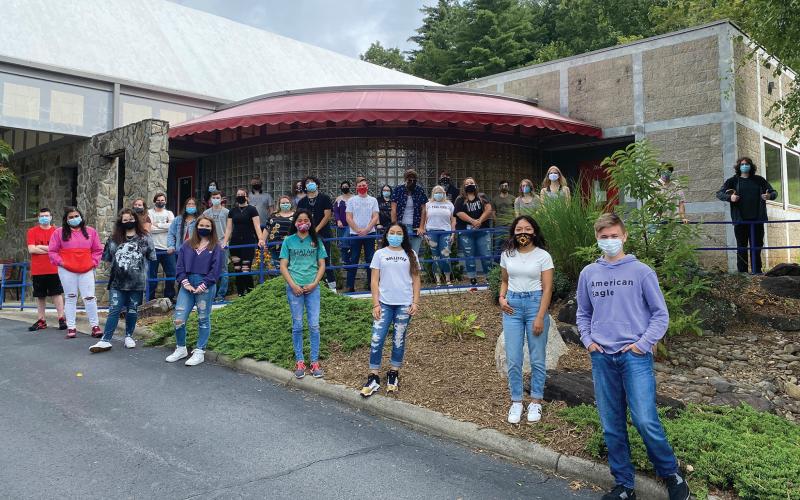 Students at Mayland Early College High stand outside of their school socially distanced and masked before the start of the first days of instruction this past week. (Photo courtesy of MECHS)