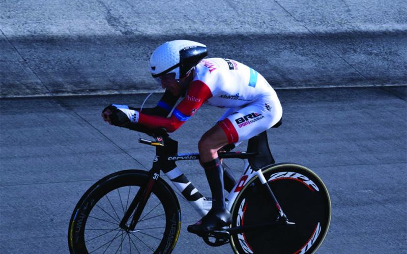 Bakersville cyclist Marc Poland pedals on during his recent world record attempt at Bristol Motor Speedway. Poland set the record for the fastest 100-kilometer ride by a male cyclist in the 60 to 69-year-old age group with a time of two hours and 31 minutes. Poland rode at an average of 24.64 miles per hour and was supported by a crew of local friends and cycling enthusiasts. (Submitted photo)