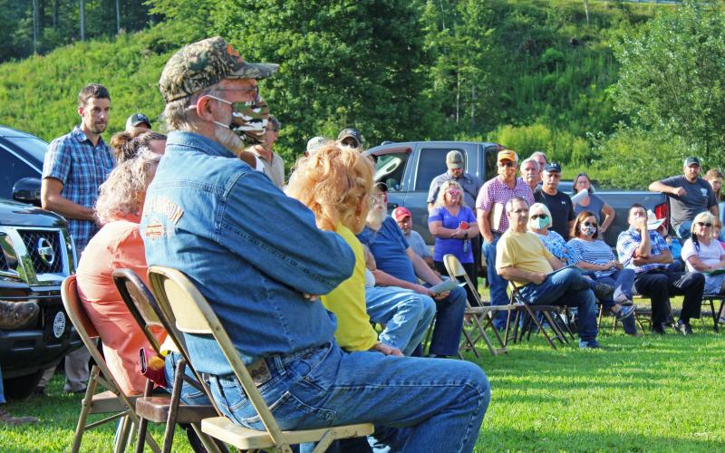 A group sits and listens Tuesday, Aug. 25 during the special meeting of the Mitchell County Commissioners at the Poplar Community Building. (MNJ Photo/Juliana Walker)