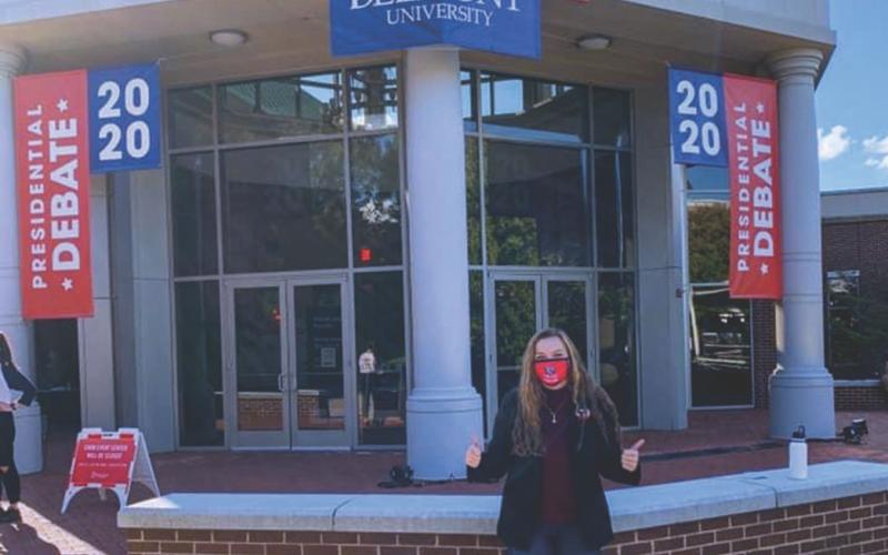 Spruce Pine native and Mitchell High graduate Cassi Phillips poses outside of the Belmont University Curb Event Center hours before the final Presidential Debate of the 2020 election season was held inside. Phillips, who is the President of the Belmont College Republicans, said it was an exciting experience. (Submitted photo)
