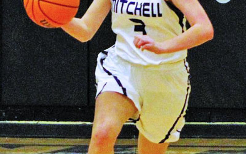 Mitchell’s Jill Pittman dribbles down the floor and looks to make a play during a game in the 2019 season. Pittman will play at Brenau College after graduation, she announced. (MNJ file photo)