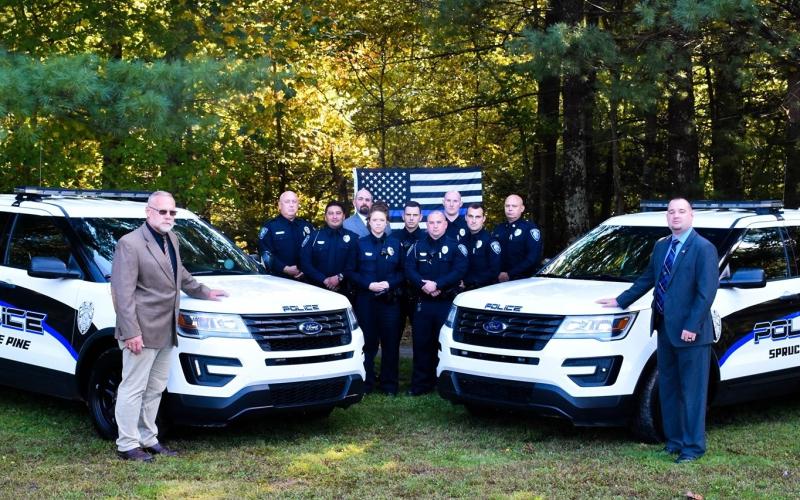 Members of the Spruce Pine Police Department pose for a photo. The department is getting some significant upgrades to incentivize employees to stay with the department. (Photo sourced from SPPD Facebook)