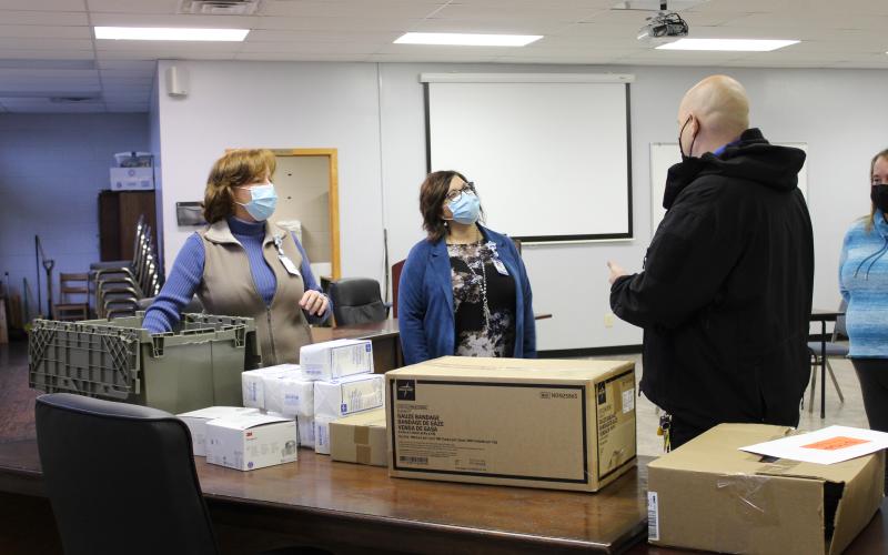 Blue Ridge Regional Hospital Administrative Manager of Clinical Operations Teressa Neill and BRRH CEO Tonia Hale speak with School Resource Officer Shane Vance about Stop the Bleed kits. (MNJ Photo/Juliana Walker)