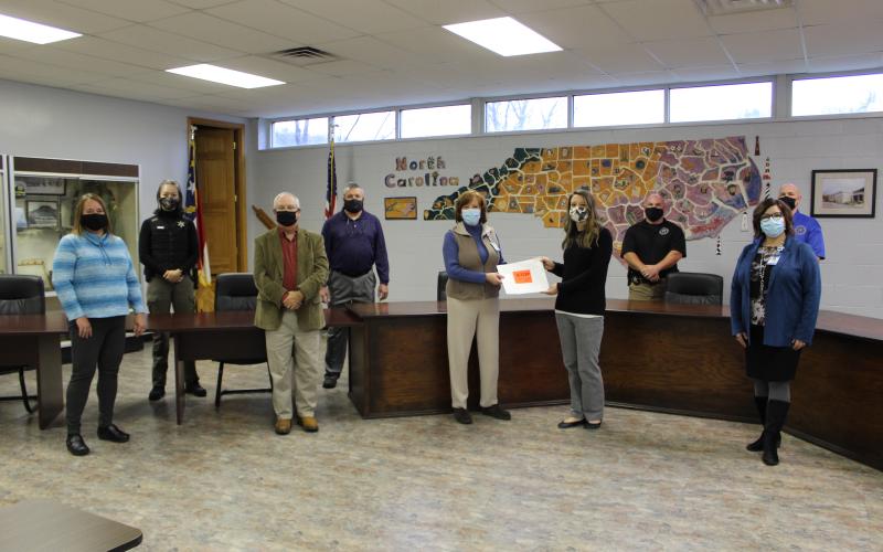 Several gathered on Monday, Nov. 30 for the donation of Stop the Bleed kits from Blue Ridge Regional Hospital to Mitchell County Schools. Pictured from left to right is Kim Hodshon, Jessica Young, Alex Glover, Chad Calhoun, Teressa Neill, Elizabeth Sparks, Justin Biddix, Tonia Hale and Shane Vance. (MNJ photo/Juliana Walker)