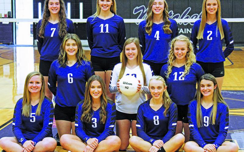 The Mitchell High varsity and junior varsity volleyball teams met on Friday, Dec. 4 for team photos. Varsity volleyball: In the back row, from the left, is Annali Silver, Savannah Banks, Marybeth Woody and Meredith Dellinger. In the middle row, from the left, is Peighton Robison, Brooke Brewer and Zayda Carver. In the front row, seated from the left, is Paigelyn Branch, Chloe Carter, Erika Gouge and Bailey Brinkley. (MNJ photo/Cory Spiers)