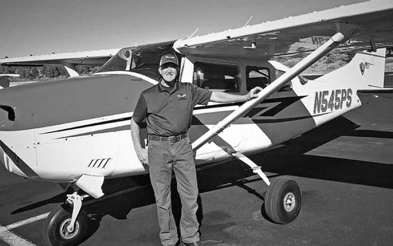 Mitchell native Galen Howell stands in front of a fixed-wing aircraft. He was recently tabbed as the 2020 National Park Service Aviator of the Year. Howell grew up in Spruce Pine, the son of Joe and Nell Howell. His father owned Joe Howe’s store in Ingalls for more than 50 years.