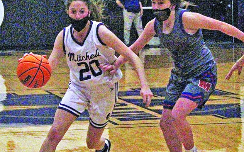 Junior guard Annali Silver drives past a Madison defender during a home game on Thursday, Jan. 21. Silver registered a pair of defensive rebounds and assists in 13 minutes played as the Mountaineers downed visiting Madison 56-24. (MNJ photo/Cory Spiers)