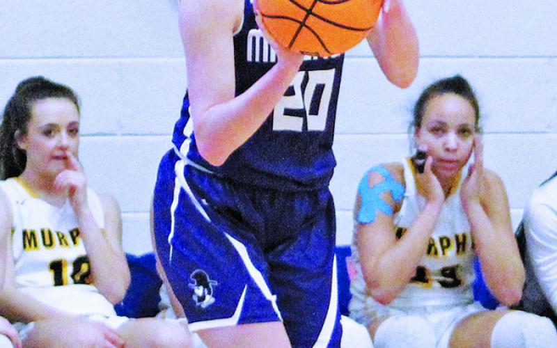 Paige Johnson puts up a shot against Murphy during the 2019-20 season. (MNJ file photo)