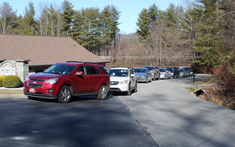 The line of cars waiting to enter the Spruce Pine Fire Department for the pop-up vaccination clinic caused some traffic disruption in the early hours of Thursday, Jan. 14. At one point, the cars were on the far side of Burleson Hill. (MNJ Photo/Juliana Walker)