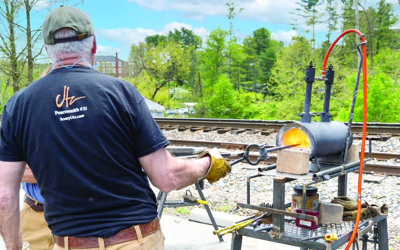 Photo/Courtesy of the Mitchell County Tourism Development Authority. Blacksmiths demonstrates traditional techniques at Fire on the Mountain in 2023.