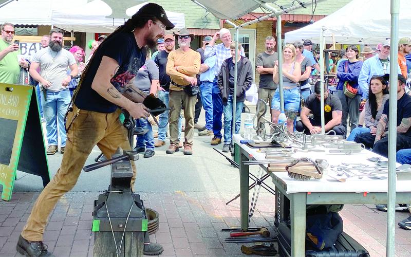 MNJ photos/Rachel Hoskins. Pete Braspenninx, owner of Phyre Forge in Michigan, was the featured blacksmith for the festival.