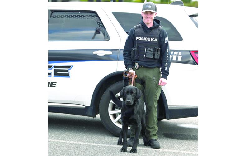 MNJ photo/Sarah Quintas. SPPD Officer Dalton Mace with Thor, the newest member of the SPPD.