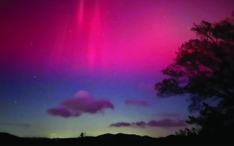 Photo/Chris Garland. The Northern Lights dazzle above the Blue Ridge Parkway, offering a rare celestial spectacle not seen since 2005.