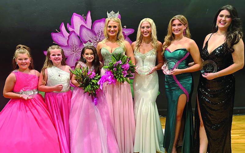 Submitted photo. Andi Creech was named 2025 NC Rhododendron Queen and Allison Fairchild was named 2025 NC Junior Rhododendron Queen at the annual North Carolina Rhododendron Festival. From left are junior runners-up Scarlett Burleson and Scout Stevenson, Fairchild, Creech, and queen runners-up Carly Sanderson, Kaylyn Fairchild and Jessie Grant.