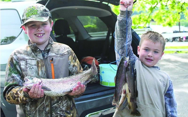 MNJ Photos/Sarah Atkins. Colten Phillips, right, and brother Brayden Phillips proudly show off their catch.