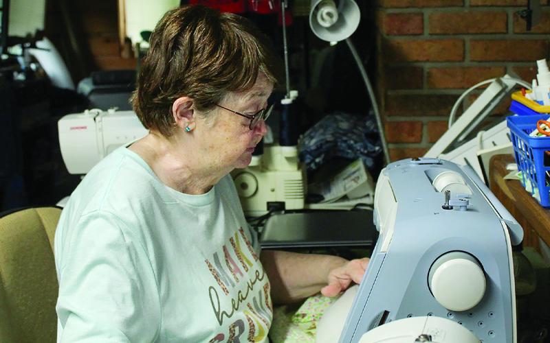 MNJ photo/Sarah Atkins. Ina Hilemon has run a sewing and alterations business for 38 years, and uses this machine she calls “Babe” for many of her projects.
