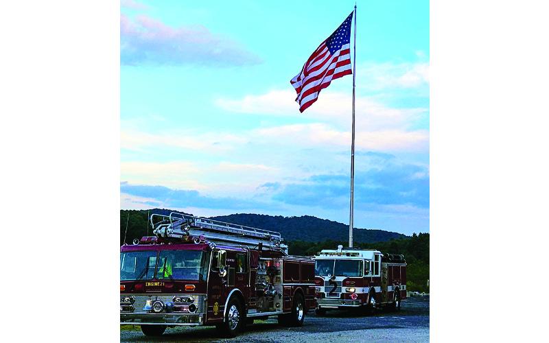MNJ Photo/Jana Malone.  Mitchell County firefighters and other first responders held a parade and memorial service last week to honor first responders killed in the Sept. 11, 2001 terrorist attacks.