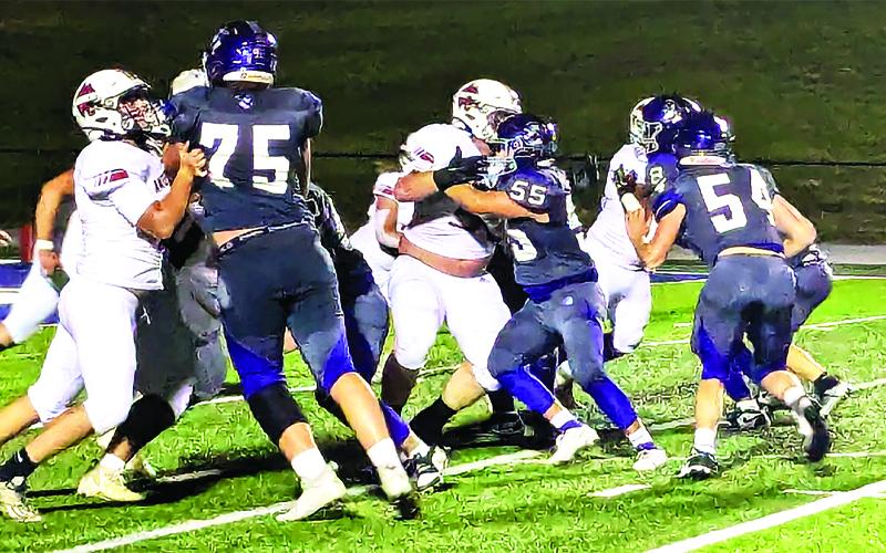 MNJ photos/Brian Hobson. Caleb Cook rolls to his right on a quarterback keeper.