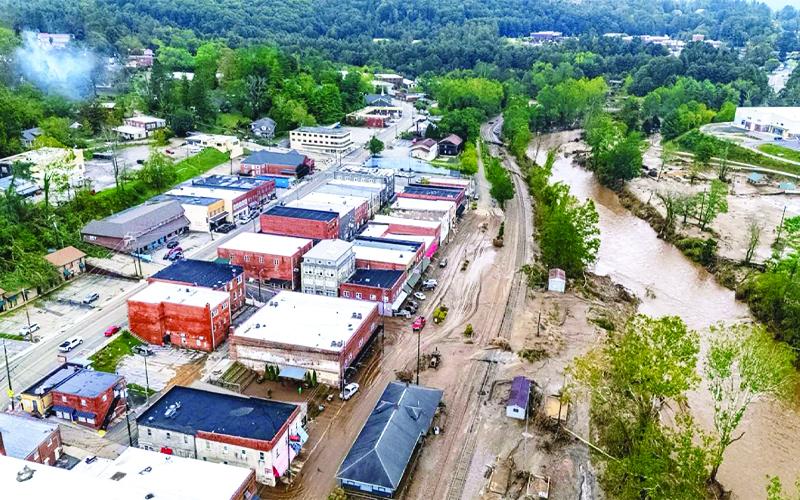 Photo/Hunter Levi, Trains.com. As water recedes, the impact of flooding on downtown can be seen from above.