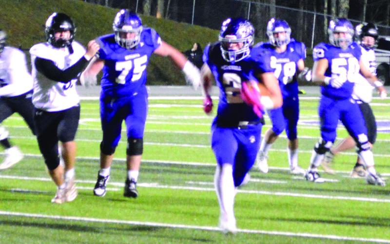 Kaj Pittman heads for the end zone. Mitchell won the game 39-28.