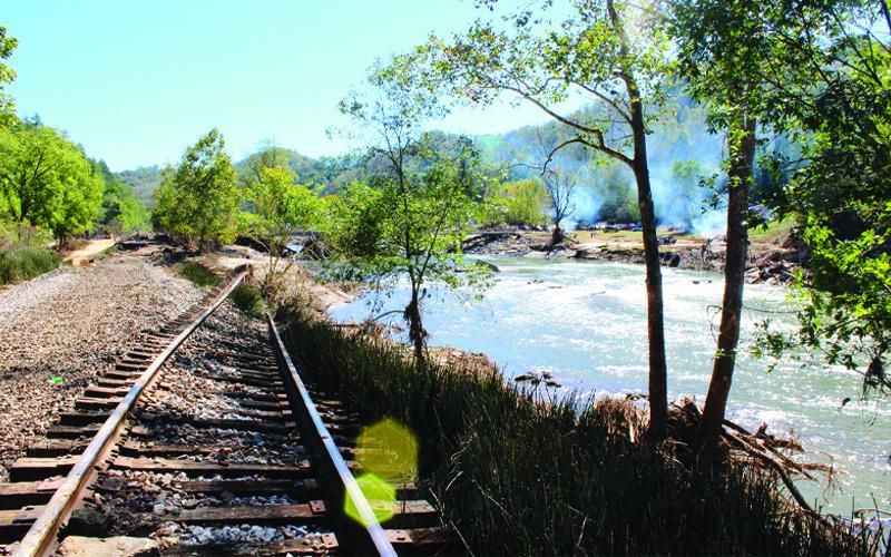 MNJ Photo/Mariel Williams.  The North Toe River ripped up miles of railroad track in Mitchell County, with significant damage in Spruce Pine and the more rural northern communities.