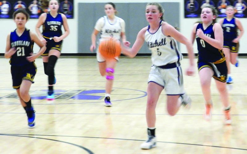 Submitted photo.  Cayma Farley leads the fast break against Cloudland.