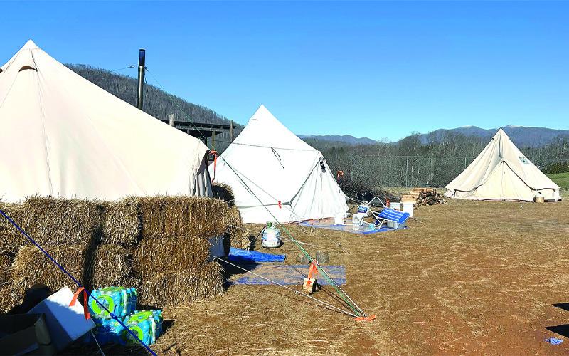 Artic Tents are built to withstand high winds and extreme cold. They have a wood or propane stove for heat that they can cook on.