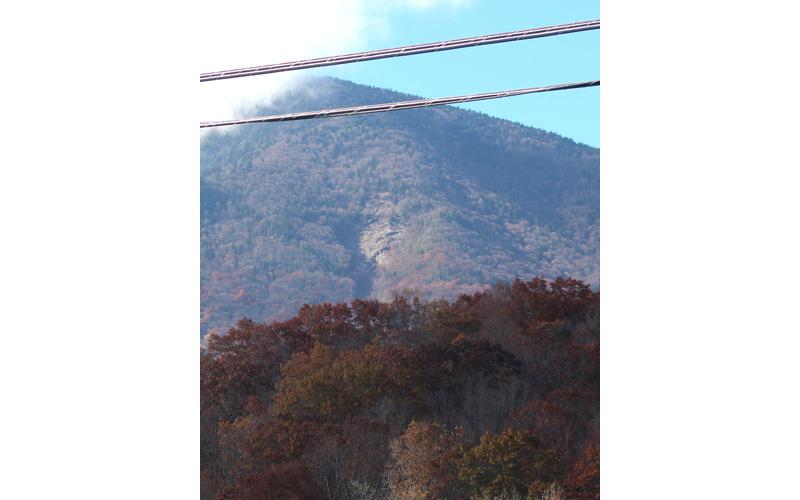 MNJ photo/Mariel Williams.  This new rockslide on Celo Knob in Yancey County will probably be a permanent feature on the landscape following Hurricane Helene.
