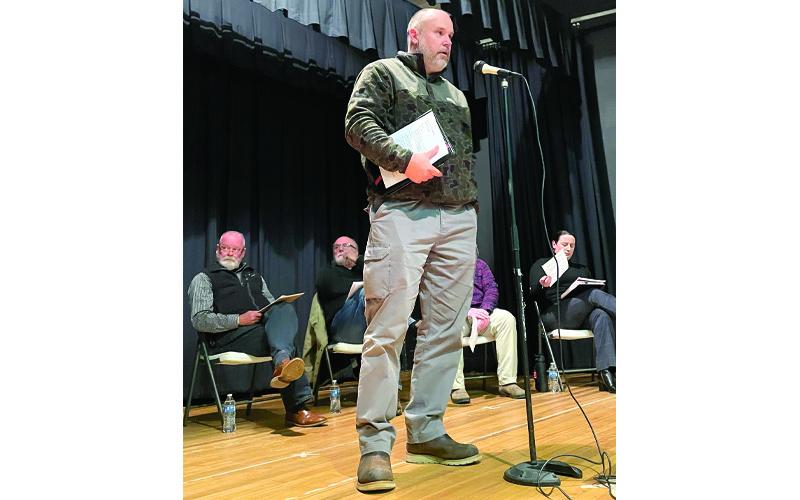 MNJ Photo/Mariel Williams.  Mitchell County Manager Allen Cook speaks at a town hall meeting in Bakersville.