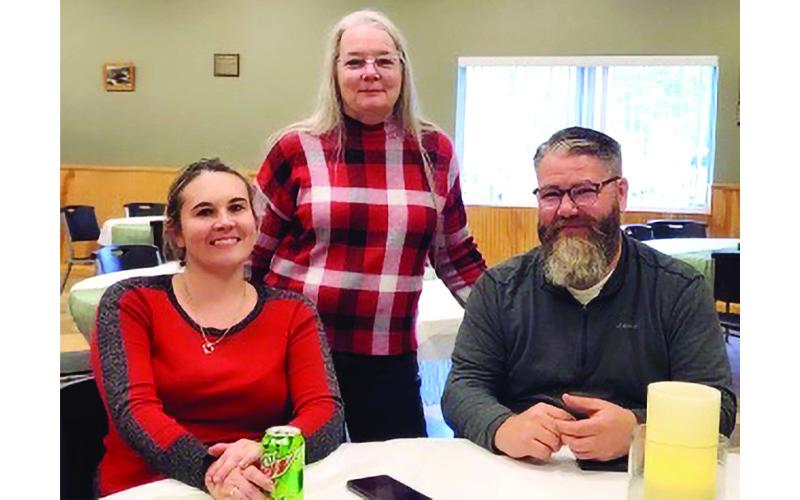 Submitted photo.  From left, Finance Officer Crystal Young, retiring Town Manager Darlene Butler and Parks and Recreation Director Michael Wood pose at Butler’s retirement reception.