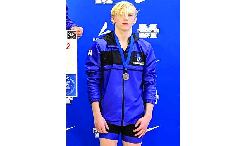 Noah Burke, right, placed third in his weight class in the Gavin Sharpe Memorial this past week.