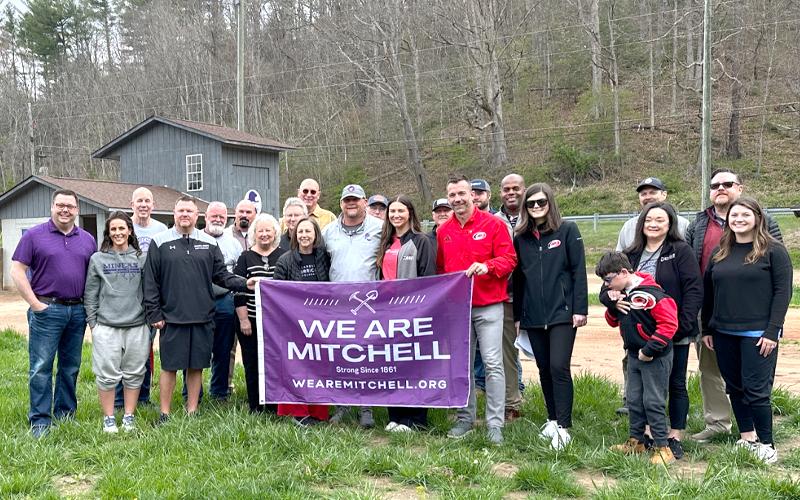 Submitted photo.  Representatives of the Carolina Hurricanes met with members of the Mitchell County Board of Commissions and county staff as they presented the county with $150,000 to help restore the Wade Tipton Memorial Park in Bakersville.