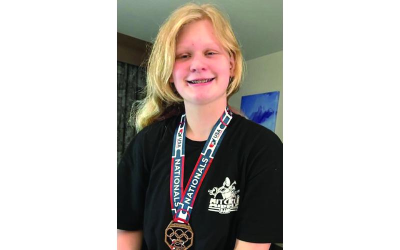 Submitted photo.  Jayceemae Erwin of Mitchell Middle School was one of two girls from North Carolina to earn a medal and All-American recognition at the U.S. Marine Corps Women’s National Freestyle Championships recently.