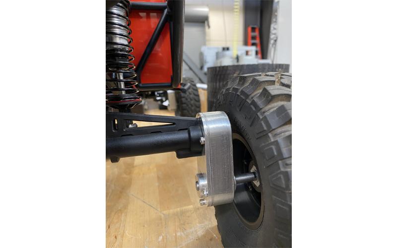 Submitted photo.  For their project, Mayland’s SkillsUSA competitors identified a real-world problem common to remote-controlled rovers used by SWAT teams: low ground clearance, which limits the rover’s ability to move effectively through rough or debris-filled environments during tactical operations. To solve the issue, the team engineered a custom portal axle system — a design that raises the body of the rover without increasing its overall size.