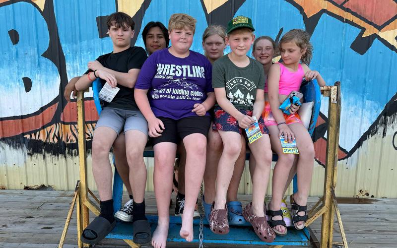 Submitted photo.  Members of the Western Carolina Wrestling Club represented this area in the 2025 USA Beach Wrestling National Championships. From left are Brett McClean, Yeshua Guardian, Madon Davis, JayceeMae Erwin, Jayko Erwin, Katie Stowe and “Raine” Erwin. Not pictured: Jaysin Erwin, Angel Castanda, Ethan Harringer, Kylie Geouge, Parker Geouge, Clayton Geouge.