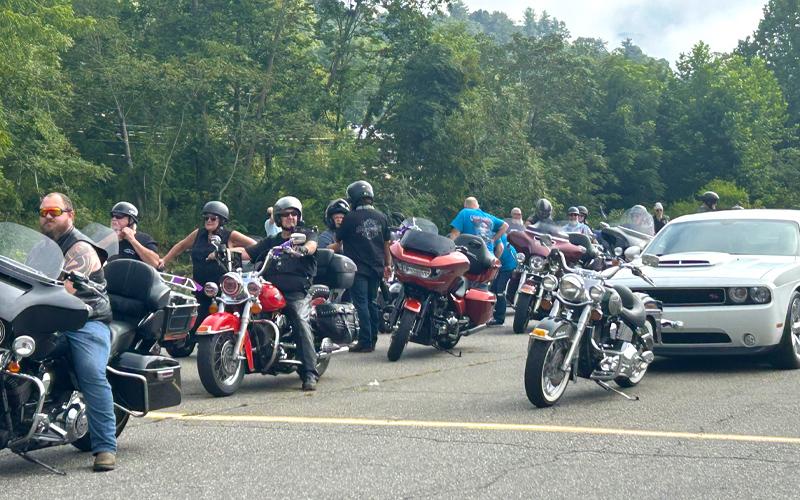 MJN Photo/Noreen Nickolas.  Bikers and automotive aficionados prepare for their journey from Bakersville to Morganton in the seventh annual Maggie’s Ride. Their participation is helping raise money for the Maggie Rae Young Memorial Scholarship Fund in honor of Maggie, age 6, who died in 2018.