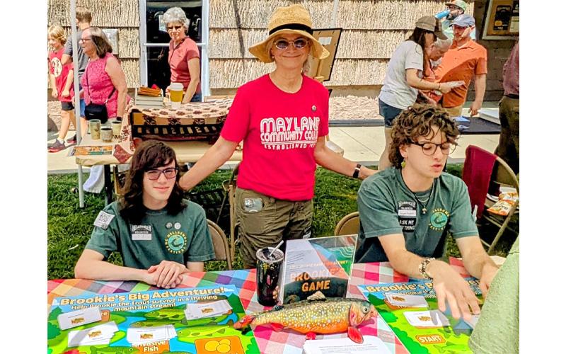 MNJ PhotoSteffen Silvis.  Mayland professor Dr. Sherry Sherman and students J.J. Woody (left) and Jason Snyder created an interactive game to draw attention to helping the Southern Appalachian Brook Trout.