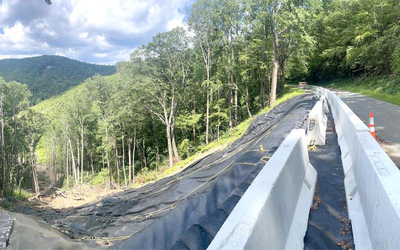 MNJ Photo/Mariel Williams.  The National Park Service is still working to repair numerous landslides on the Blue Ridge Parkway, such as this one near Buck Creek Gap in Yancey County.